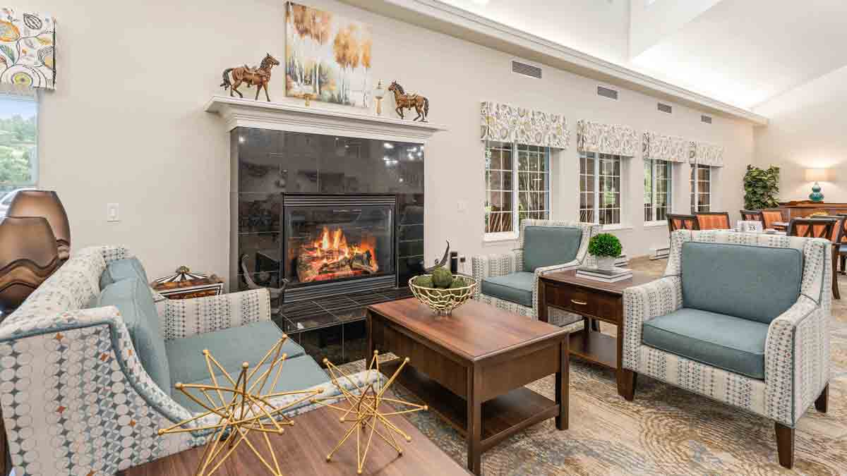 A cozy fireplace lounge at Shads Landing